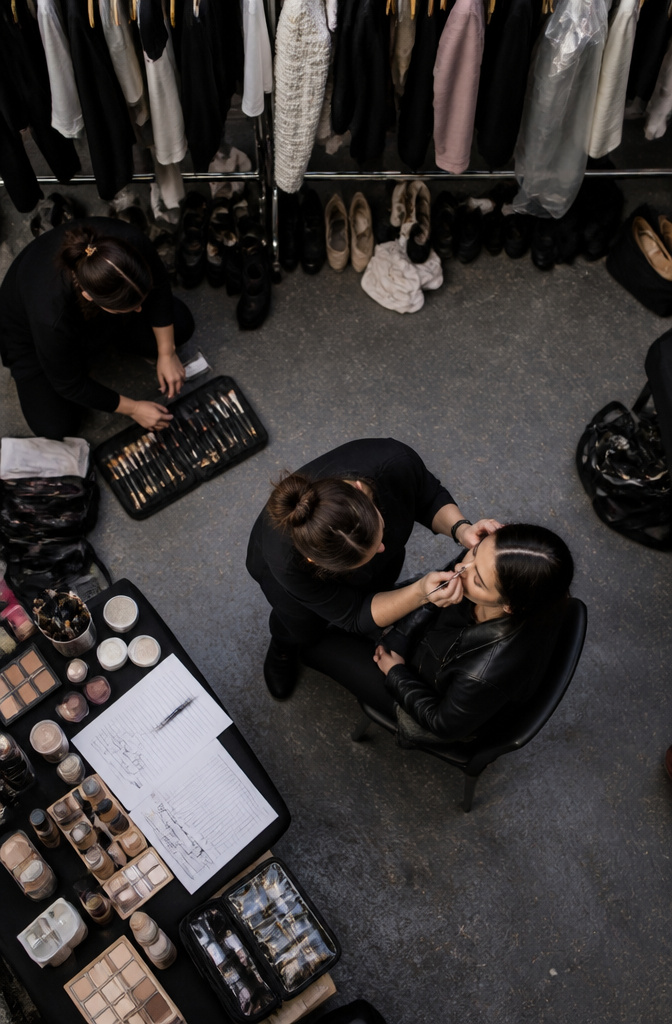 A neatly arranged brush roll and makeup tools for quick access.